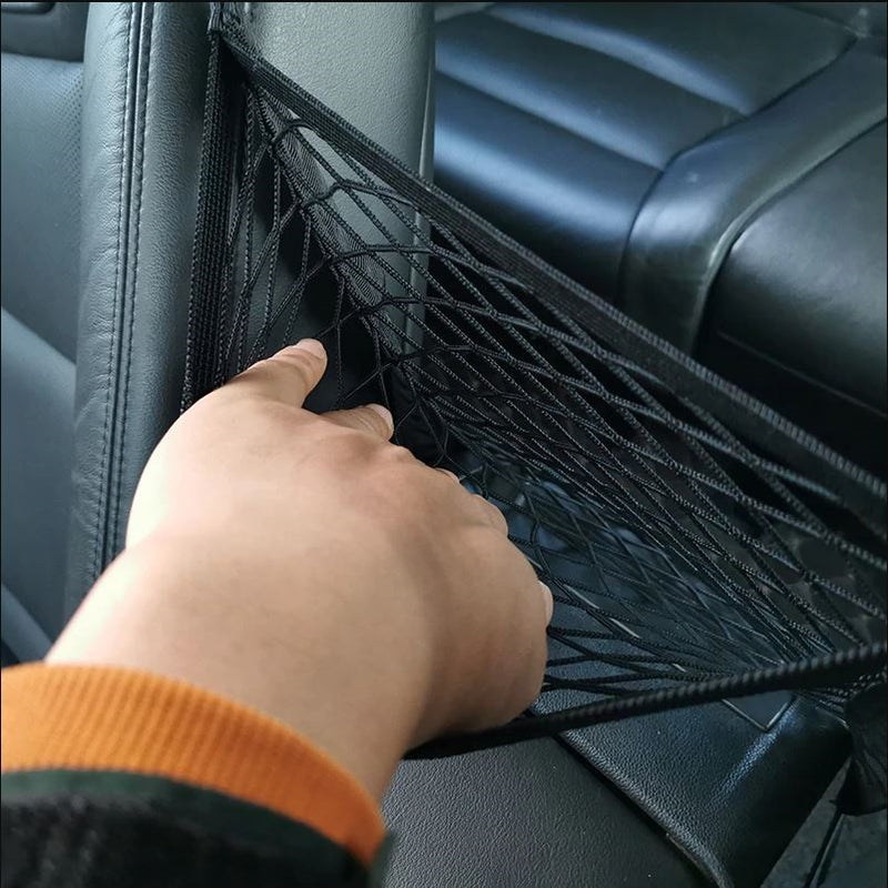 Malla elástica organizadora y barrera de asiento trasero para mascotas y niños.