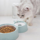 Tazón doble de agua y alimento para mascotas con base y soporte de plastico. Color Gris