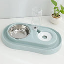 Tazón doble de agua y alimento para mascotas con base y soporte de plastico. Color Gris