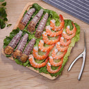 Pinza para pelar camarones y mariscos.