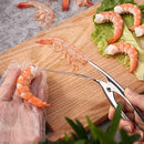 Pinza para pelar camarones y mariscos.