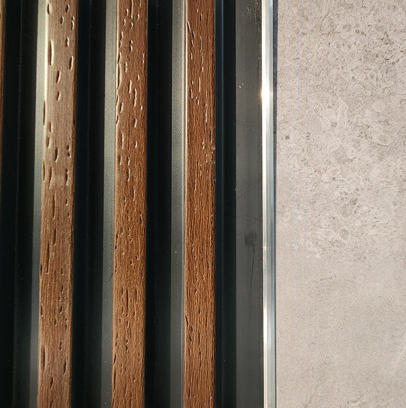 Perfil T Remate Central entre Laminas de Alternative Wall (Pared / Cielo Raso).Blanco